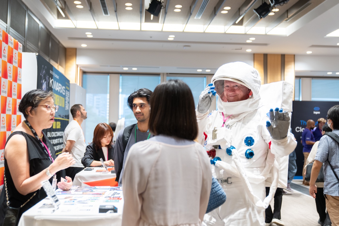 Exhibition hall buzzing with attendees and startups