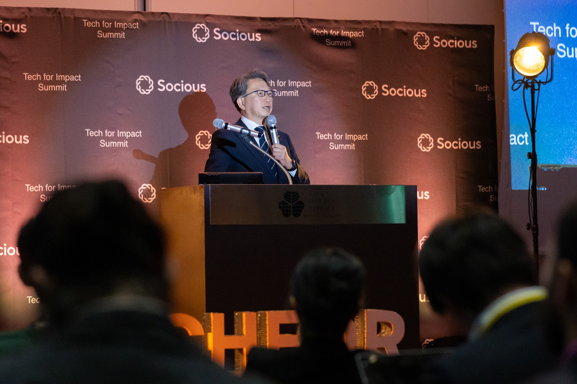 Taira gestures while explaining Japan's AI policy stack